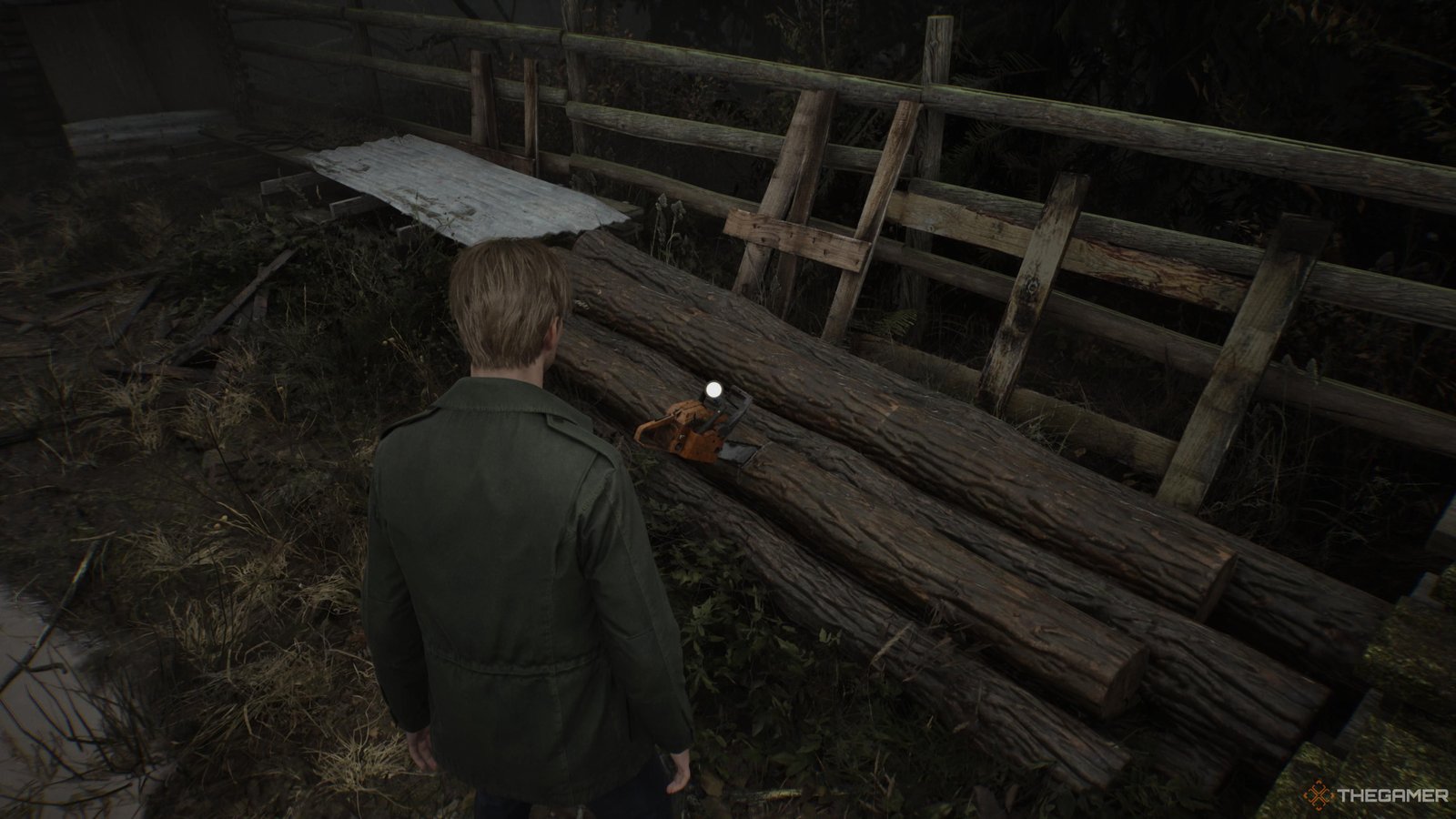 James looking at a chainsaw lodged in some logs in Silent Hill 2 remake.