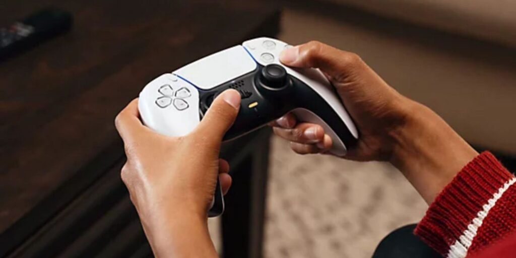 Phil Spencer Plays PS5 At Tokyo Game Show, Starts X Button Debate