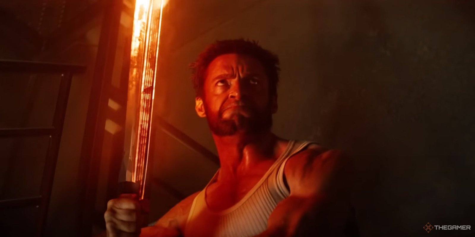 Logan holding a flaming sword in The Wolverine