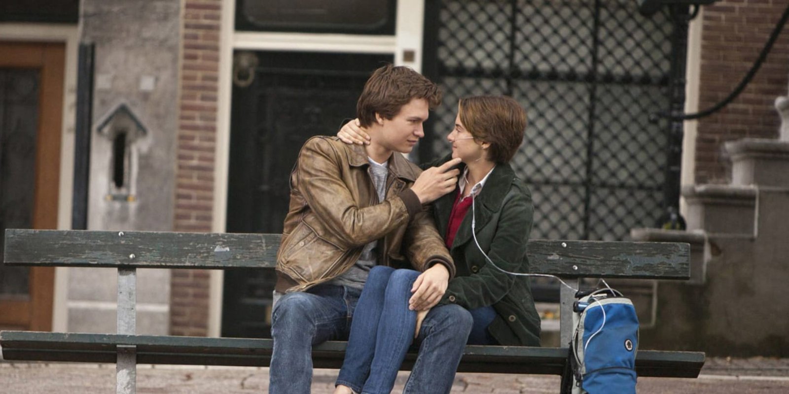 The Fault In Our Stars Hazel And Gus Staring At One Another While Sitting On A Bench