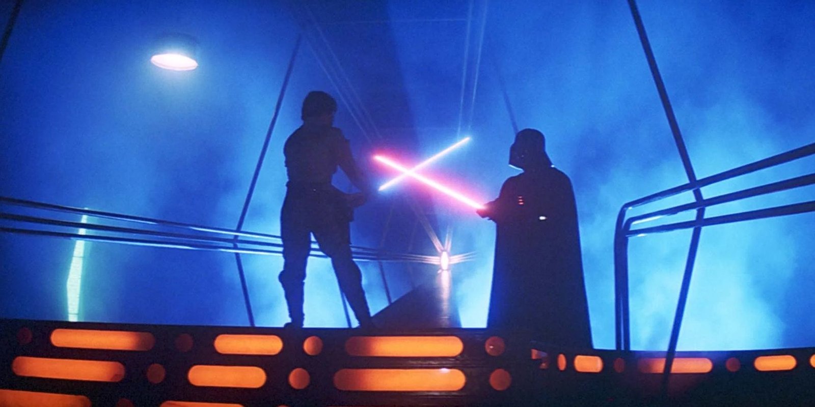 Star Wars: Episode 5 - The Empire Strikes Back Shot Of Luke Skywalker and Darth Vader Duelling With Lightsabers.