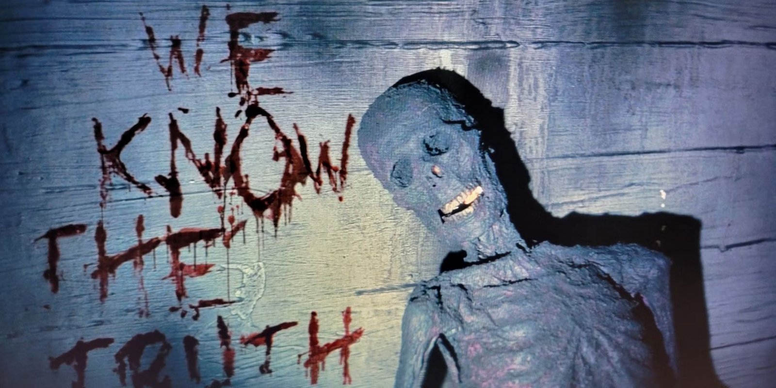 Please Keep Aliens Out Of Fallout Season 2 1 Fallout TV series old skeletal corpse in front of a wooden wall with We Know The Truth written in blood