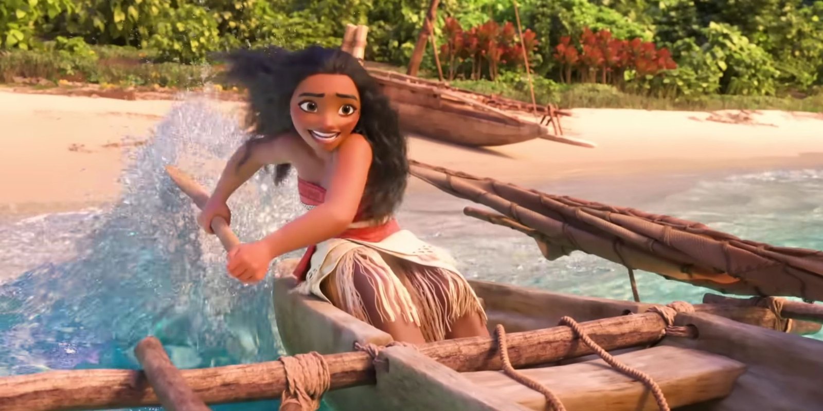 Moana paddling her raft as she takes into the ocean and sings "How Far I'll Go."
