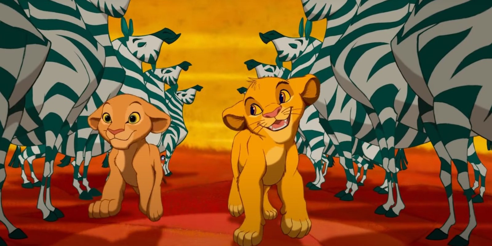 Simba and Nala strut past zebras in The Lion King