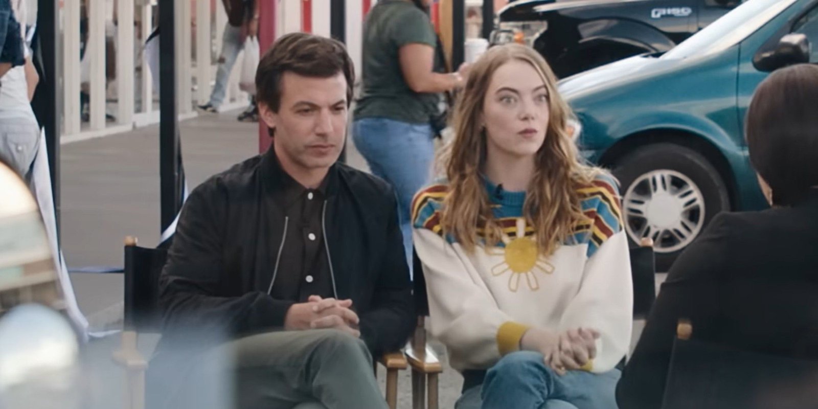 Nathan Fielder and Emma Stone being interviewed on the first episode of The Curse