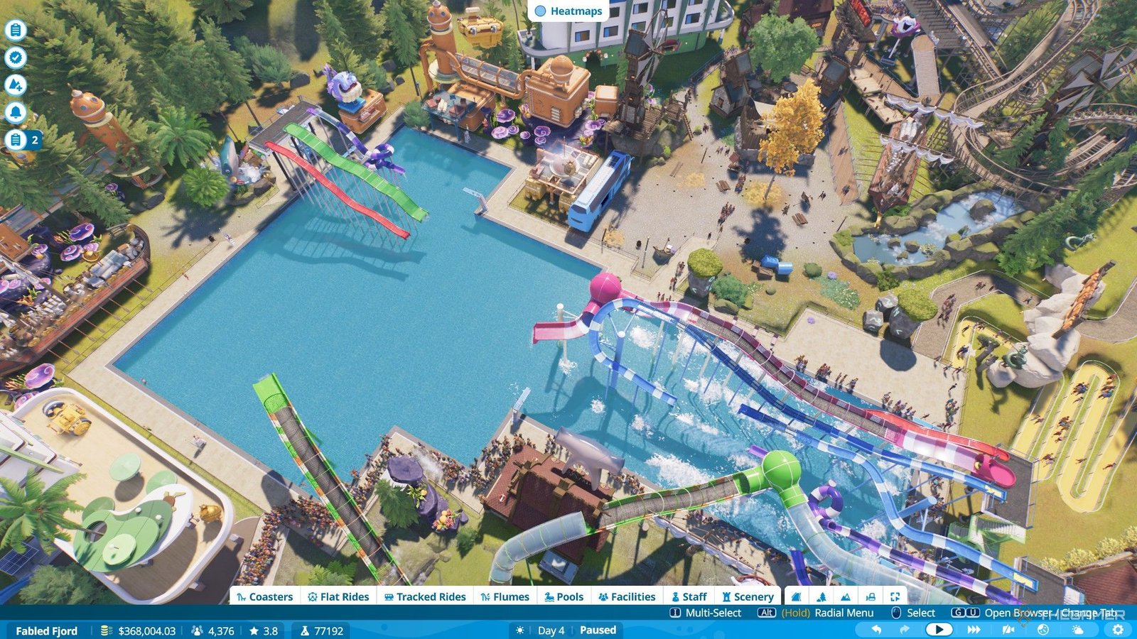 The player creates a massive pool for Fabled Fjord scenario in Planet Coaster 2.