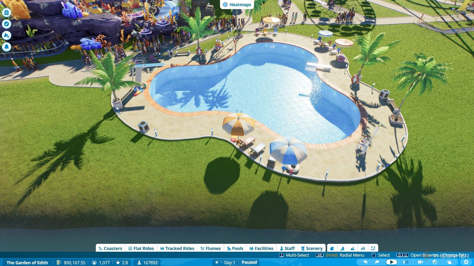 The player builds a second pool inside Edith's Garden in Planet Coaster 2.