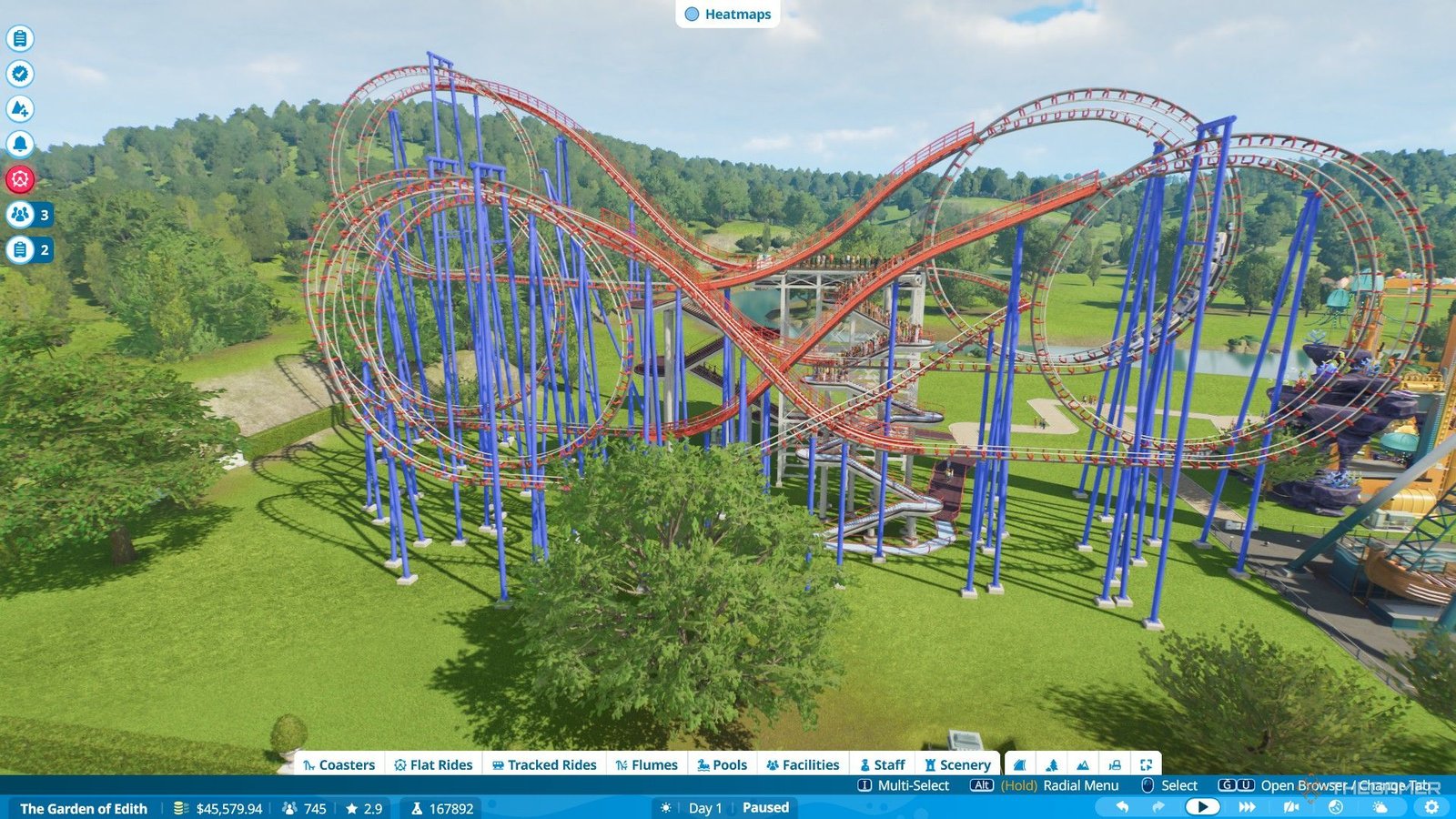 The player builds a custom coaster with five inversions in Planet Coaster 2.