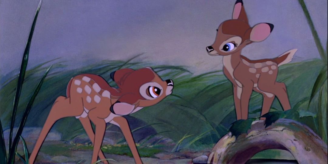 Bambi and Faline stand in a field.