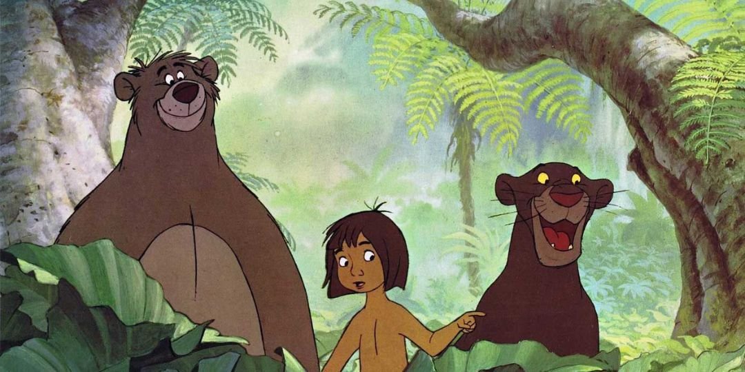 Baloo, Mowgli, and Bagheera stand in the jungle.