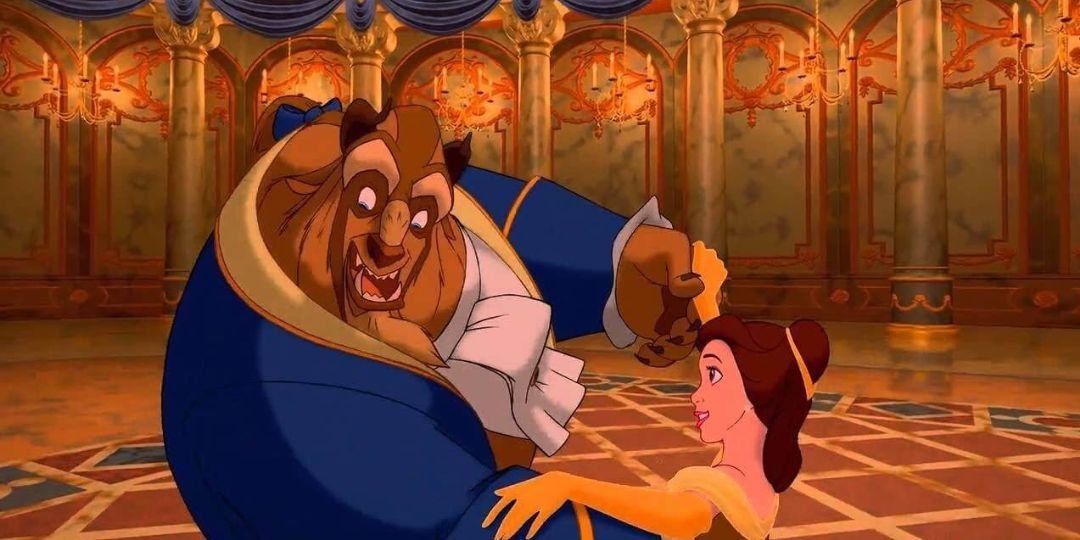 The Beast and Belle dance in the ballroom.