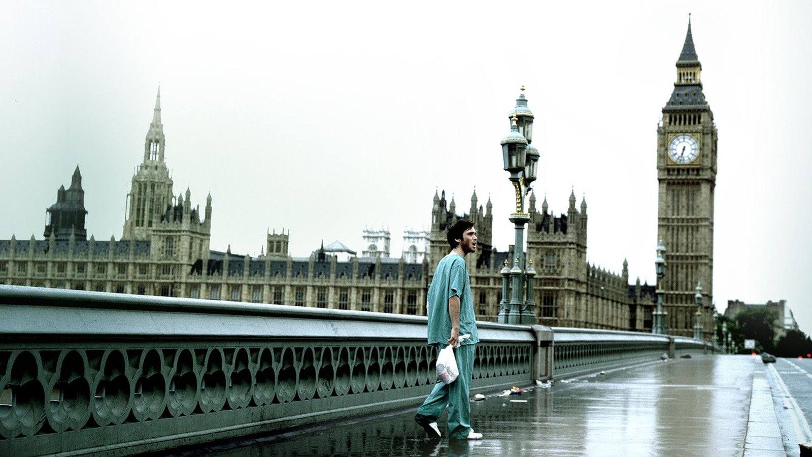 28 Years Later Is Once Again Asking Very Big Questions About Zombies 1 Cillian Murphy on the bridge in 28 Days Later.