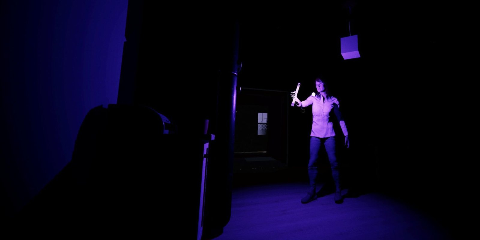 Every Levelled Unlock In Phasmophobia 1 Phasmophobia player in the dark carrying a glow stick.