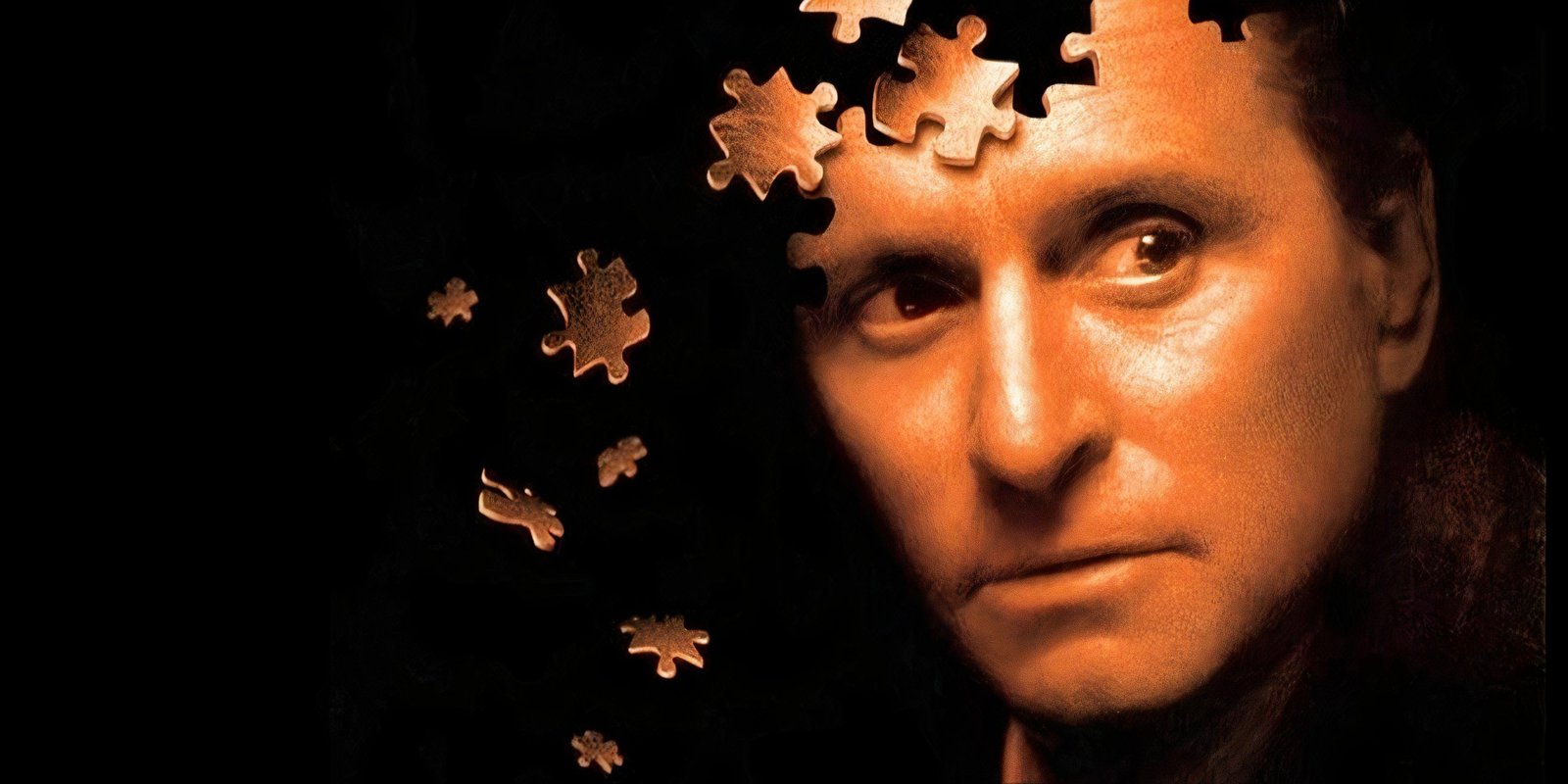 Michael Douglas' face coming off like puzzle pieces in the main art for The Game.