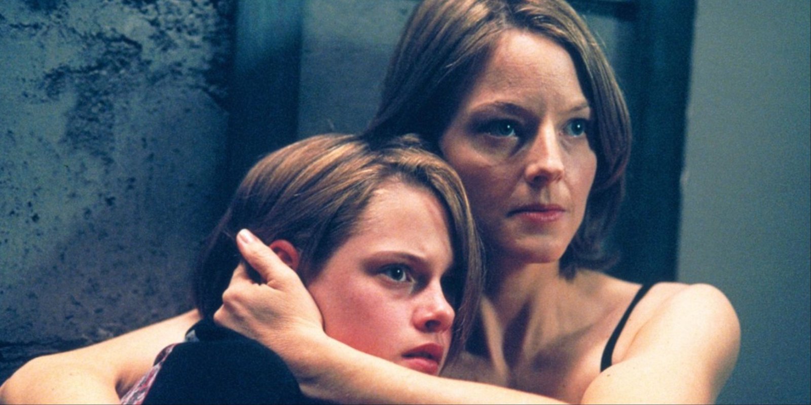 Jodie Foster holding Kristen Stewart tight in Panic Room.