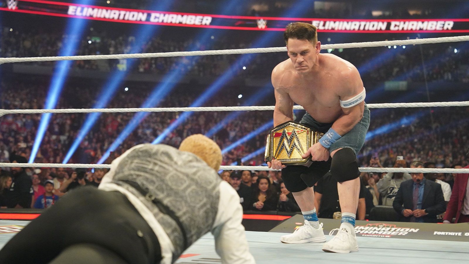 John Cena prepared to hit Cody Rhodes with the title at Elimination Chamber. 