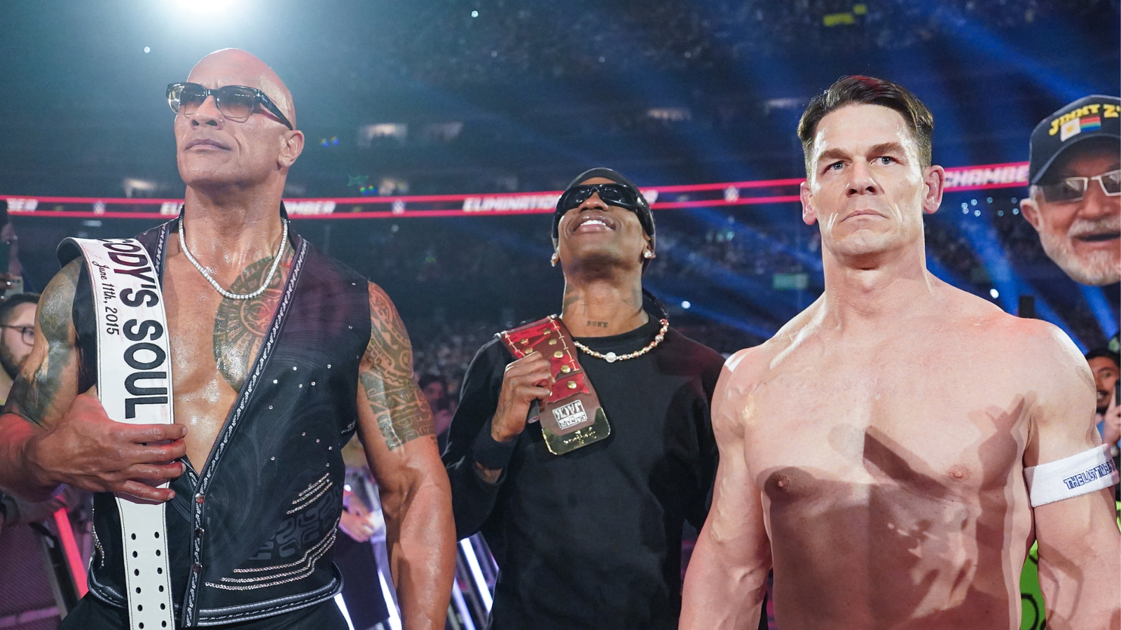 John Cena with The Rock and Travis Scott at Elimination Chamber. 