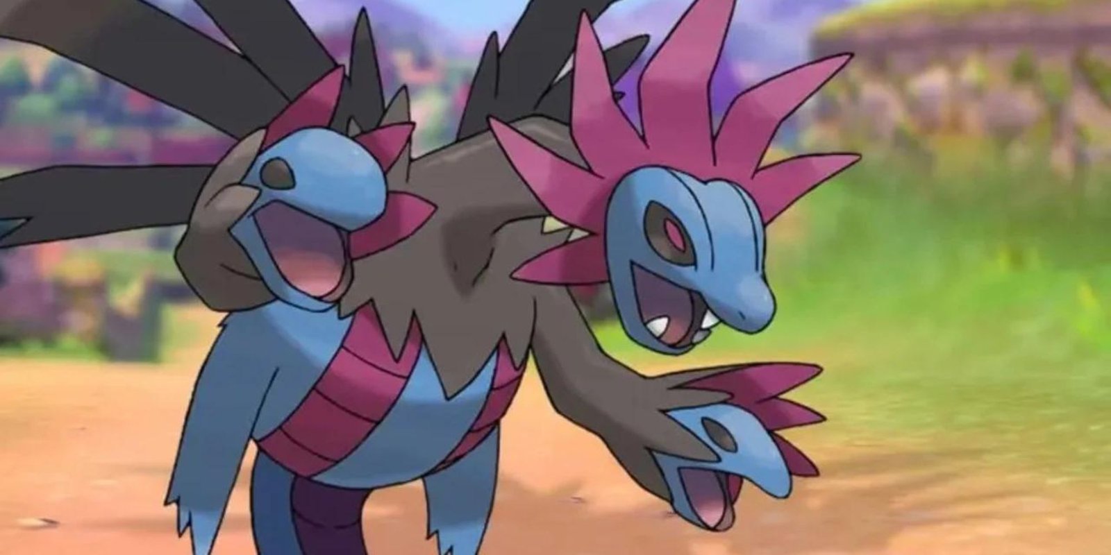 Hydreigon roaring in a field in Pokemon Scarlet & Violet.