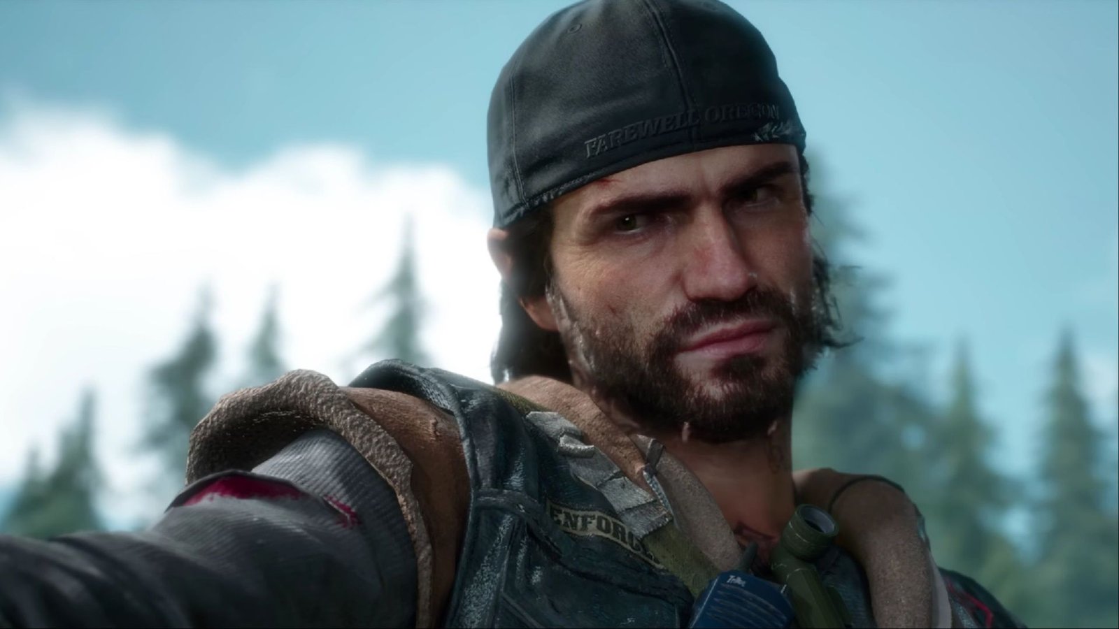 Deacon St. John pointing his gun at a Freaker in Days Gone Remastered.