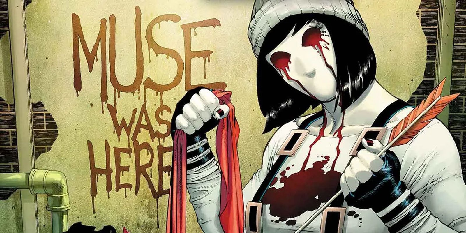 Woman dressed as Muse in front of graffiti that says Muse Was Here.