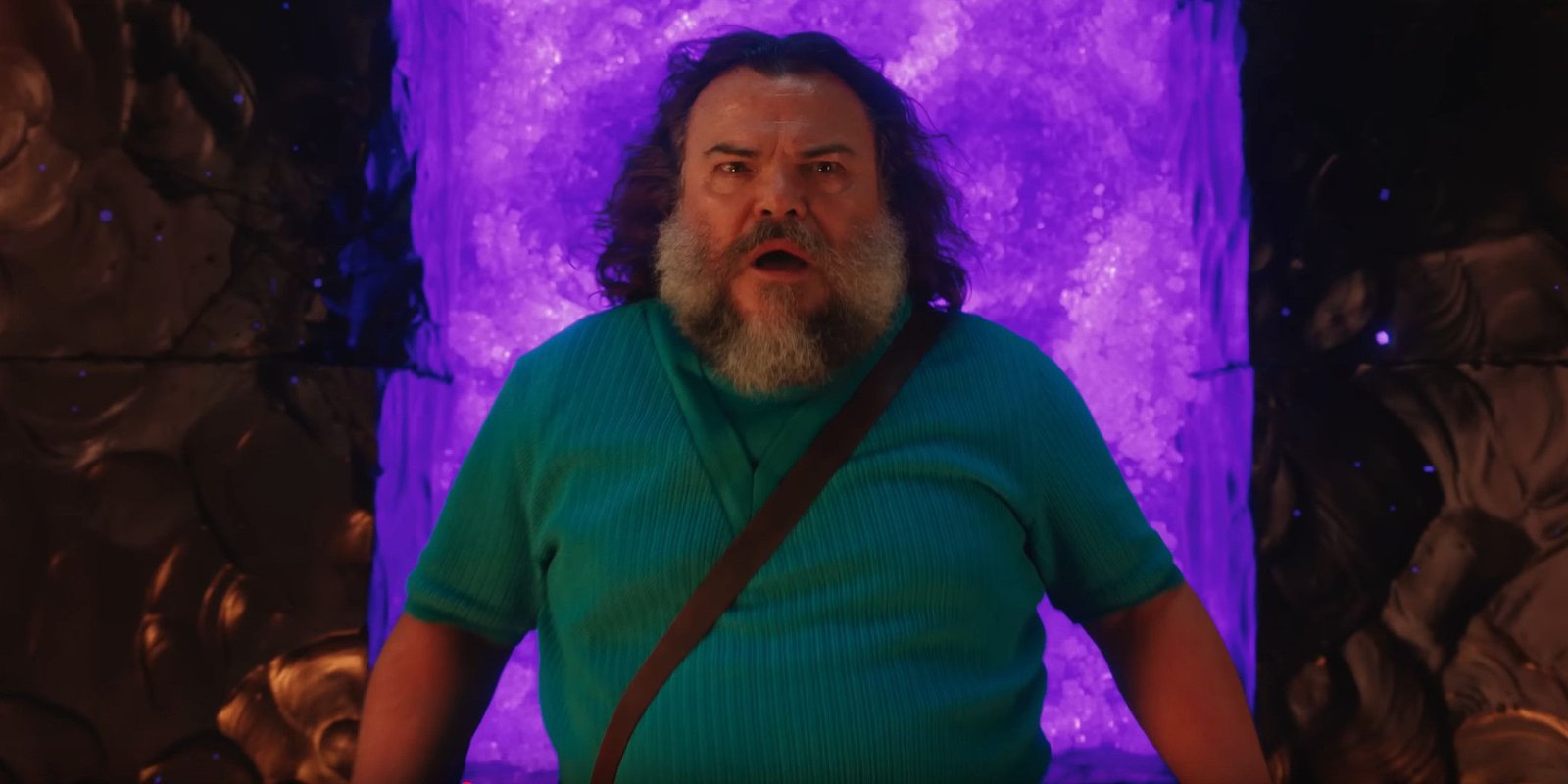 Jack Black looking concerned while stood in front of a Nether Portal
