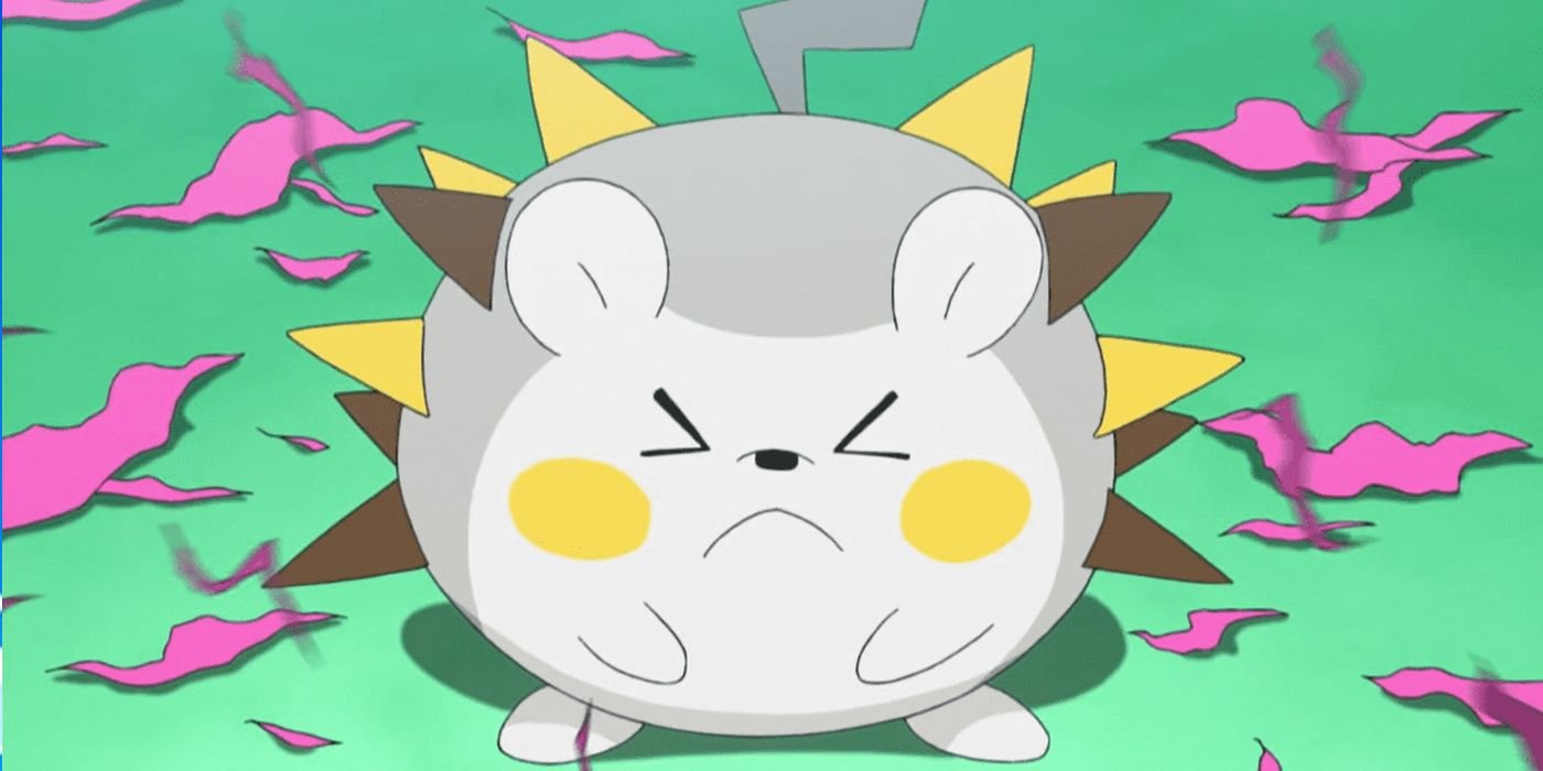 Togedemaru scrunching its face with ripped fabric surrounding it in the Pokemon anime.