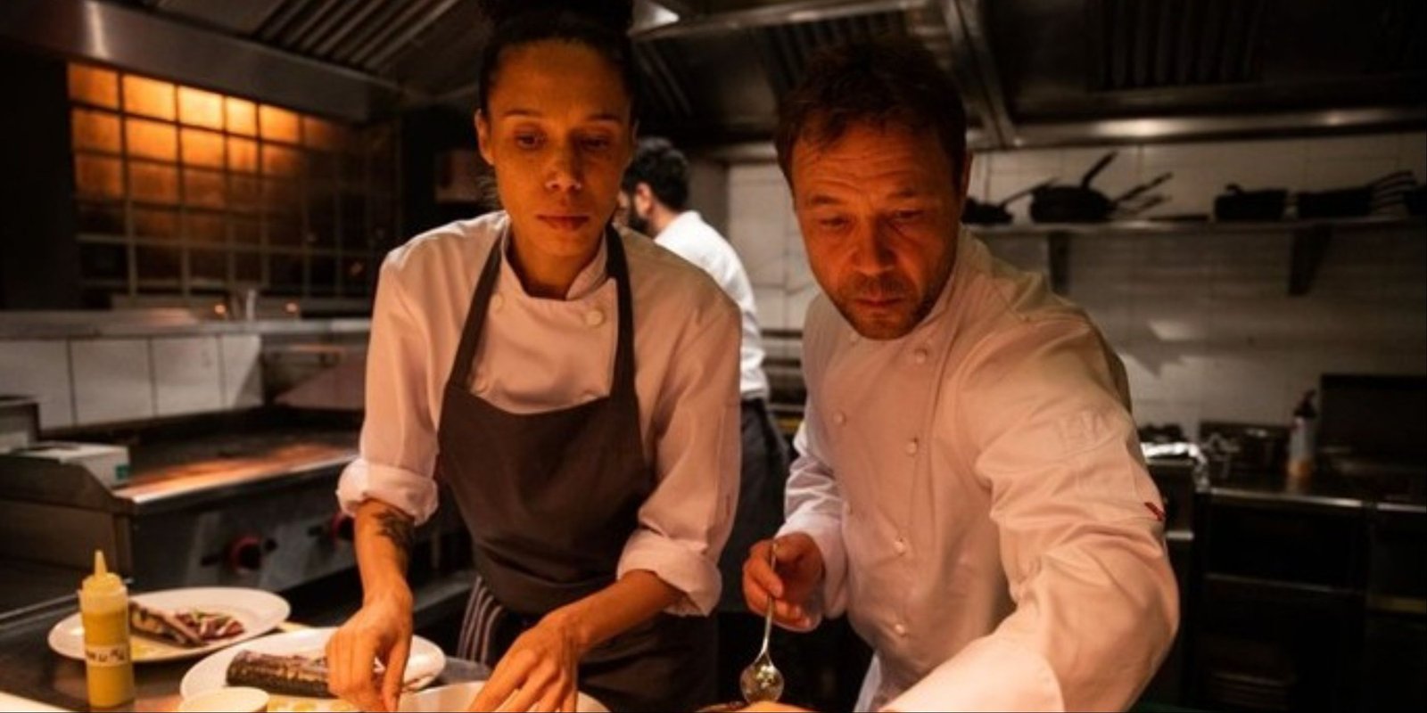 Stephen Graham and Vinette Robinson as chefs in Boiling Point.
