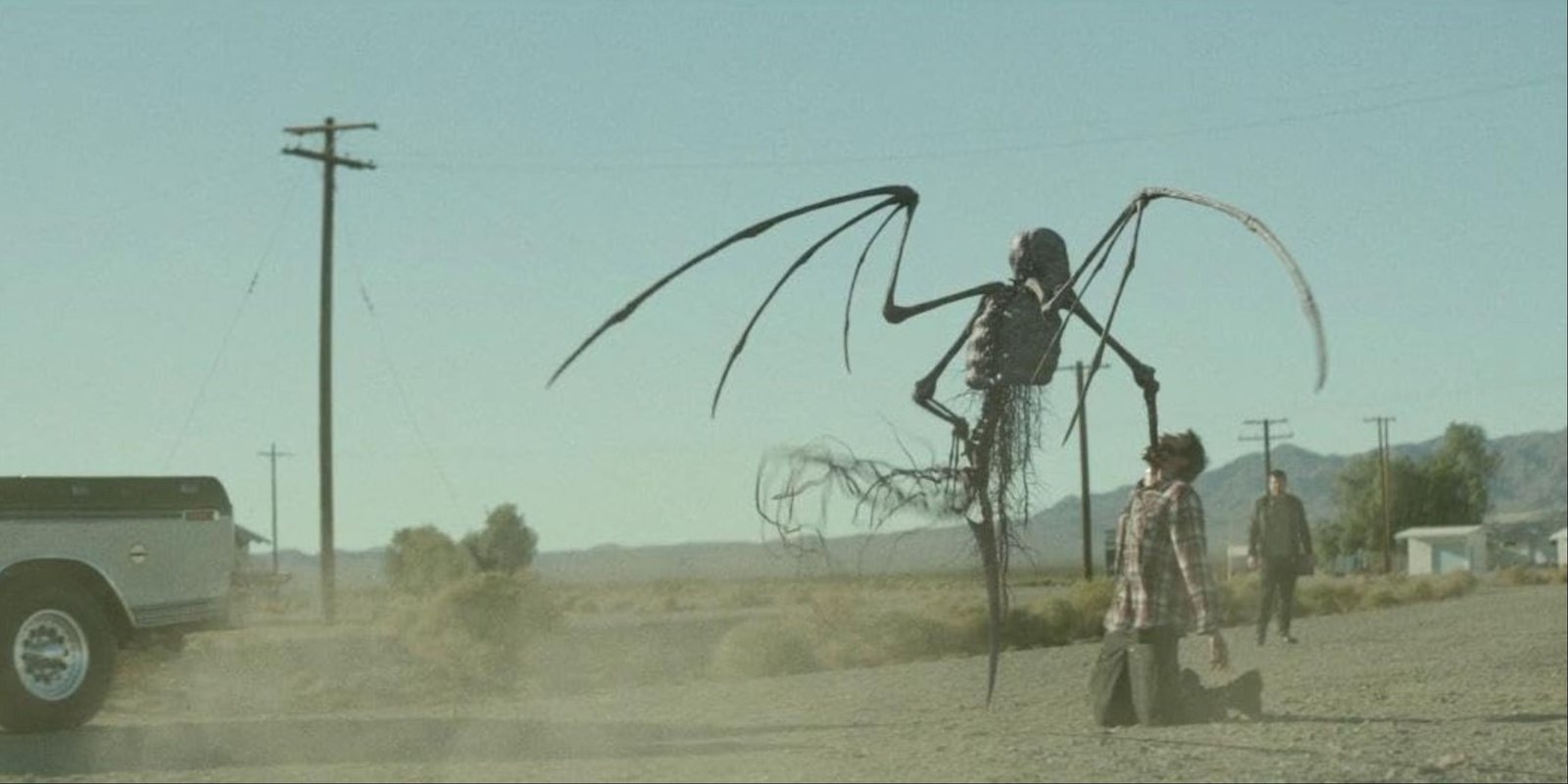 A winged skeleton creature impaling a character in Southbound.