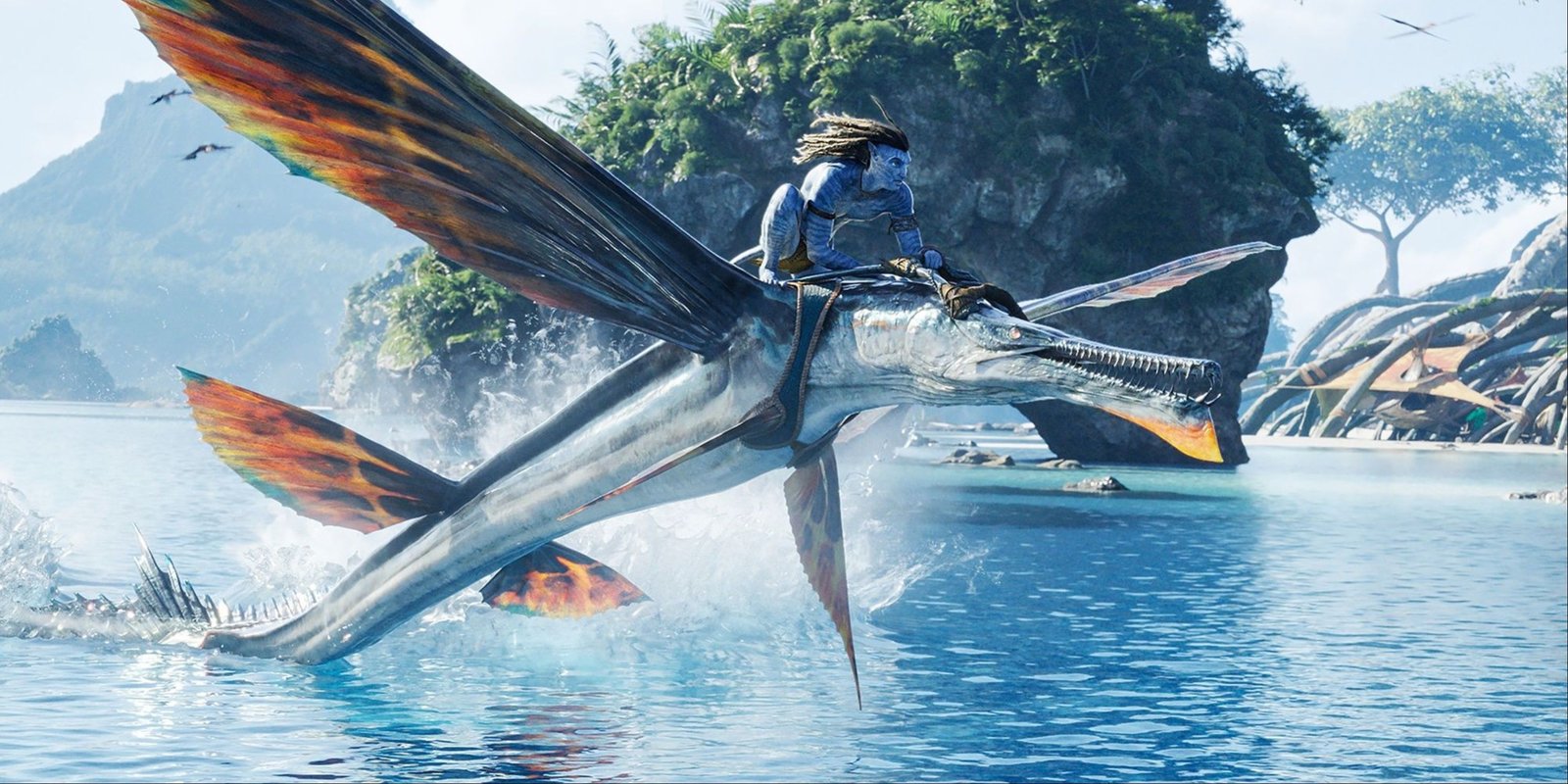 Jake Sully riding a Skimwing across the water in Avatar The Way of Water.
