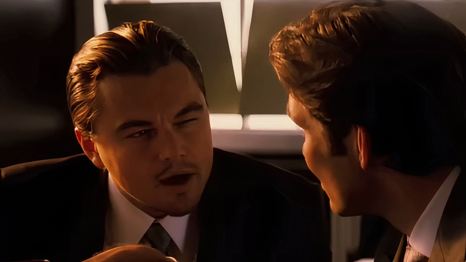 Dom Cobb and Fischer in Inception.