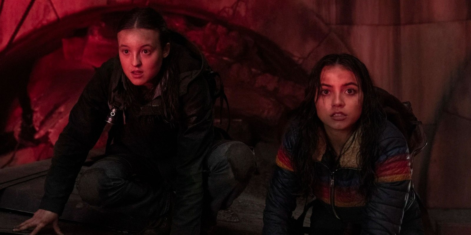 ellie and dina on a train carriage in the last of us.