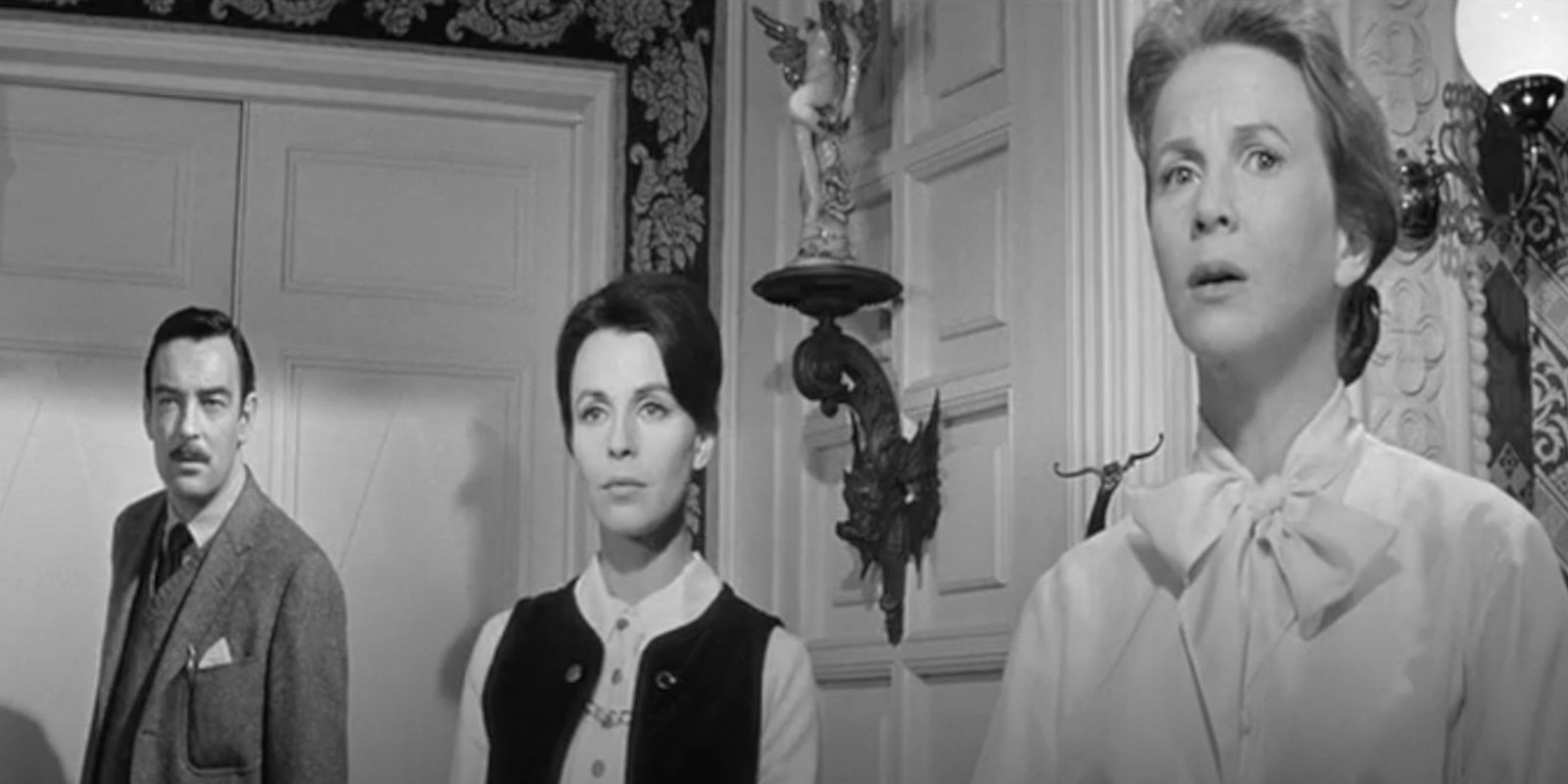 Eleanor looks tense and Dr Markway and Theodora enter the room.