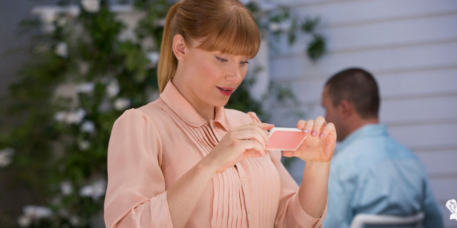 Lacie takes a photo in the episode Nosedive.