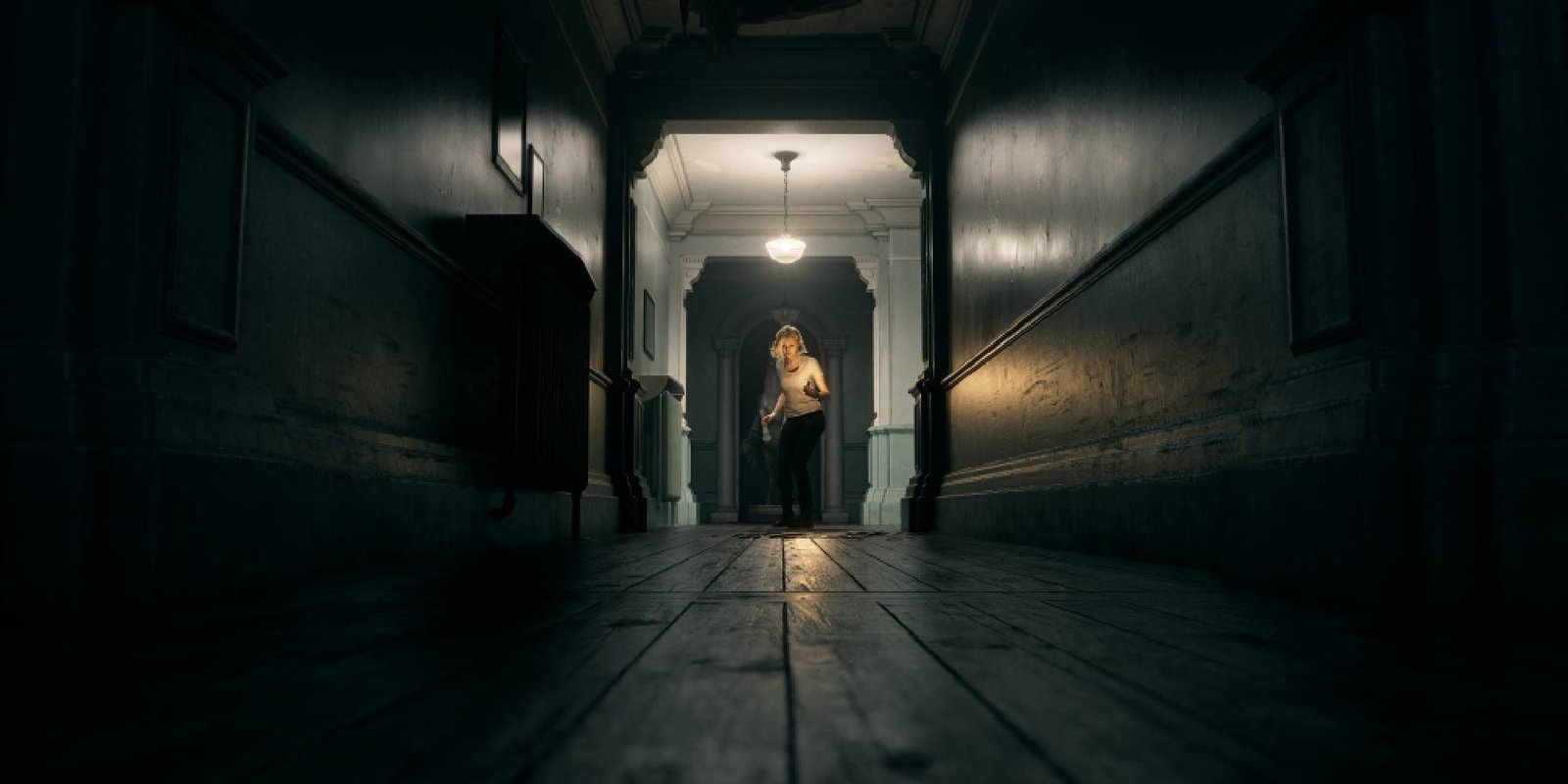 28 Years Later Just Resolved A Two-Decade Long Cliffhanger Through Its Viral Marketing 3 Resident Evil Requiem Grace Walking Towards Camera At The End Of A Long Dark Hall.