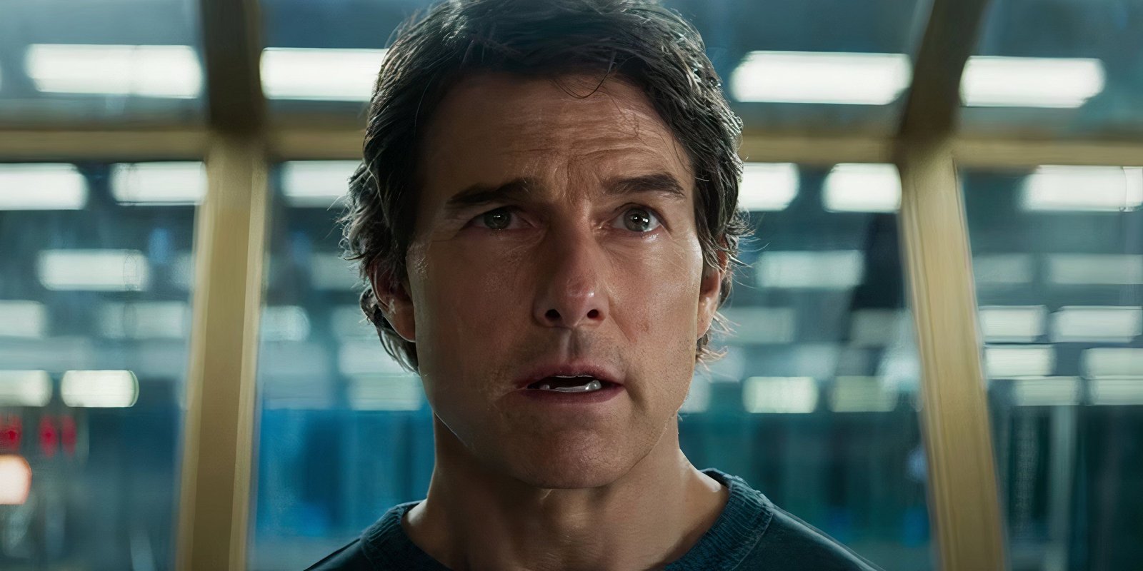 Ethan Hunt stands with his mouth slightly open in Mission Impossible The Final Reckoning.