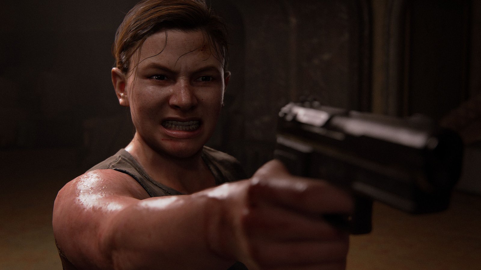 Abby aims a gun at Abby in The Last of Us Part 2. 