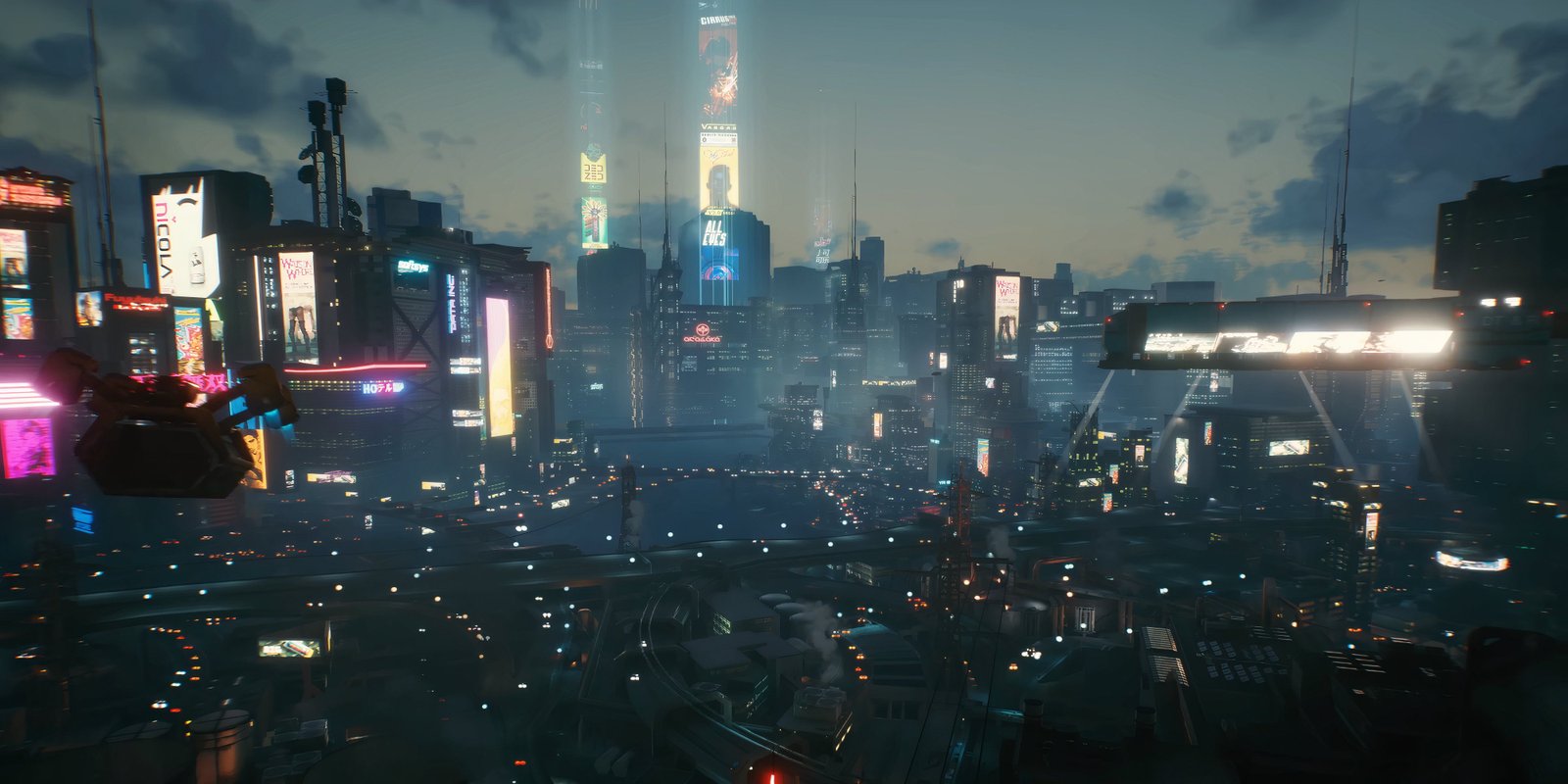 Aerial shot of night city in Cyberpunk 2077.