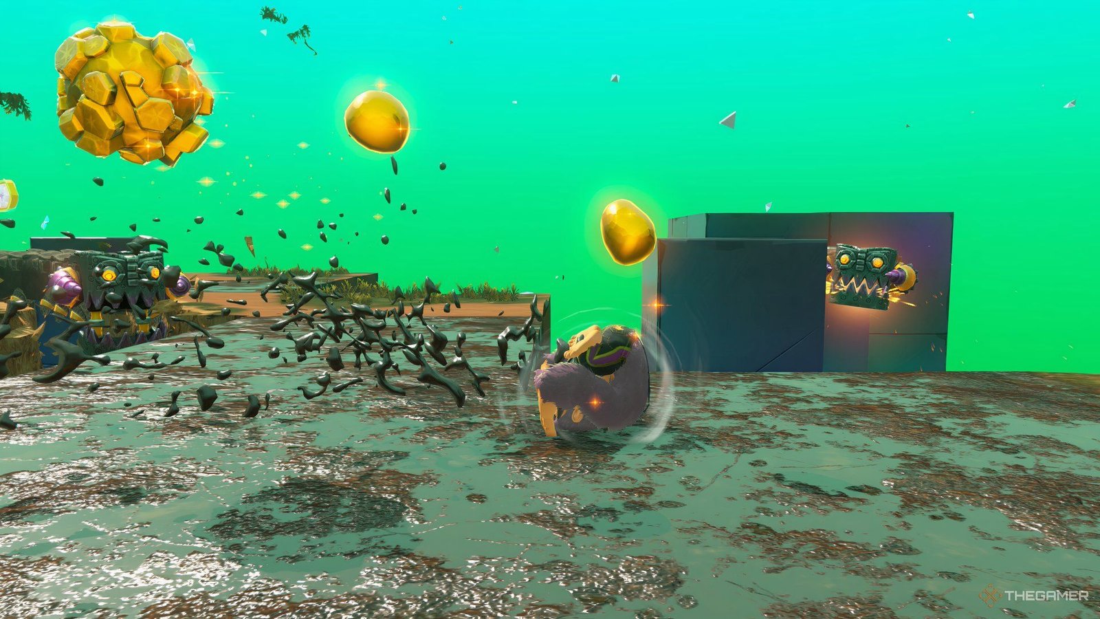 Donkey Kong collects gold while rolling through the mud in the All-You-Can-Eat Tower course in Donkey Kong Bananza.